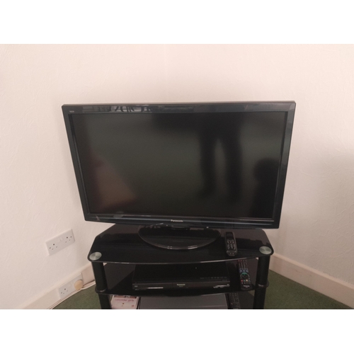 1 - Panasonic flat screen television with DVD player & VHS video recorder and one other monitor