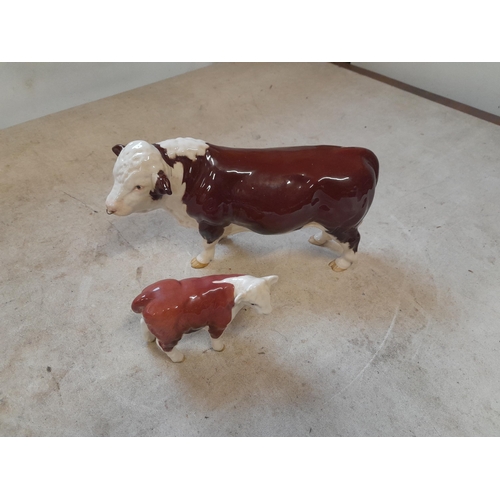 31 - Beswick Herford Bull and calf in good order