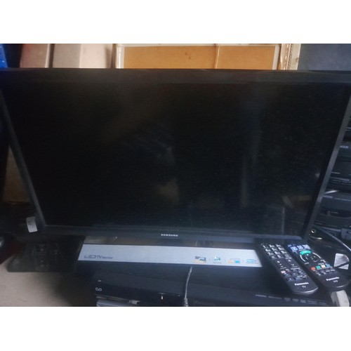 1 - Panasonic flat screen television with DVD player & VHS video recorder and one other monitor