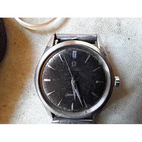 73 - Vintage Omega Seamaster in need of repair, glass off, second hand squashed, from the 1960s with a la... 