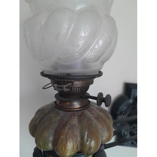 45 - Victorian frosted and etched glass cast iron wall mounted paraffin lamp with Arts and Crafts dribble... 