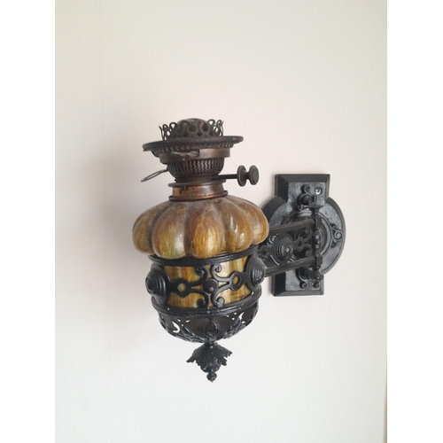 45 - Victorian frosted and etched glass cast iron wall mounted paraffin lamp with Arts and Crafts dribble... 