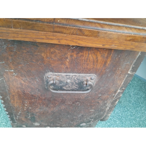 47 - Late 17th / early 18th century oak plank coffer of small proportion with later carving, lid and lock