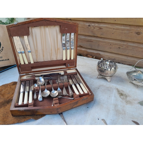 56 - Silver plated cutlery and partially filled oak canteen of cutlery