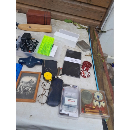 77 - Box of oddments : staple guns, hip flask, tins, magnifying glass, herb grinder, sun glasses  etc.