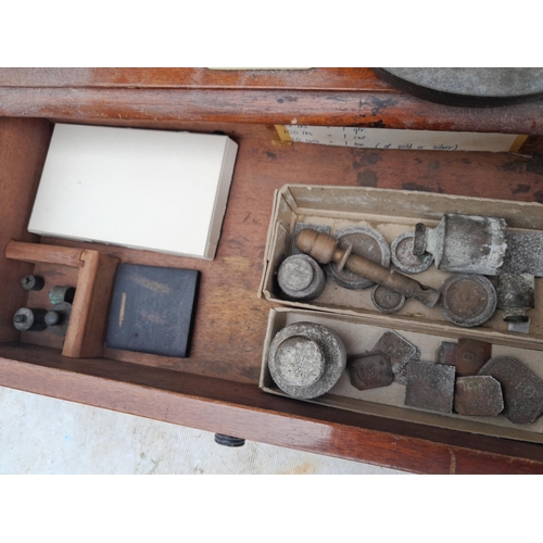 94 - 2 sets of early 20th century mahogany and brass chemist scales by De Grave , Short & Co Ltd with som... 