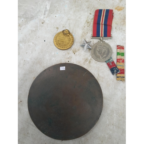 105 - World War I death plaque and medal awarded to DVR. George John Adams Royal Artillery