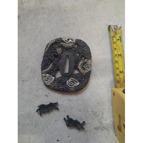 125 - Japanese cast iron Menuki and Tsuba