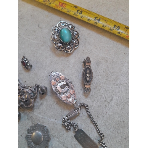 138 - Assorted silver items, costume jewellery, bracelet, medallion, damaged baby rattle etc.