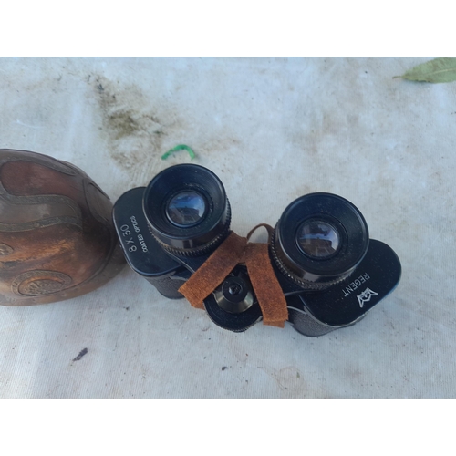 152 - Barometer, pair of modern small Fang African tourist masks, wooden cat, binoculars etc.