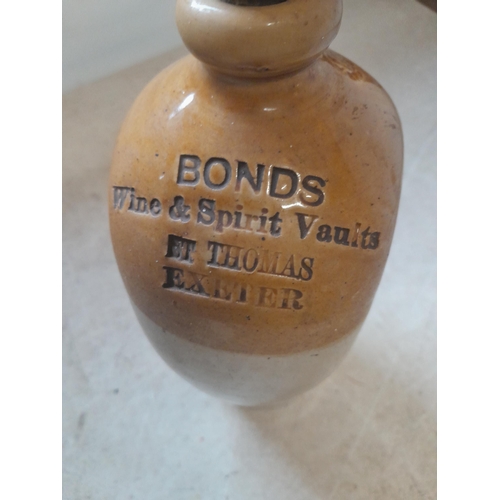 273 - Rare Bonds Wines and Spirits of St Thomas Exeter flat side stoneware spirit flagon, not chip to hand... 