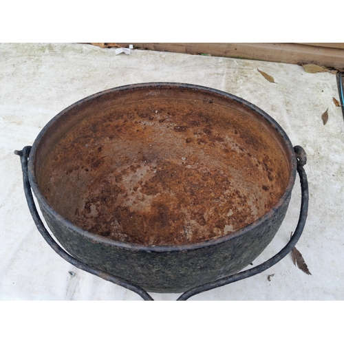 313 - 8 gallon cast iron cooking pot with swing handle (previously used as outside planter)