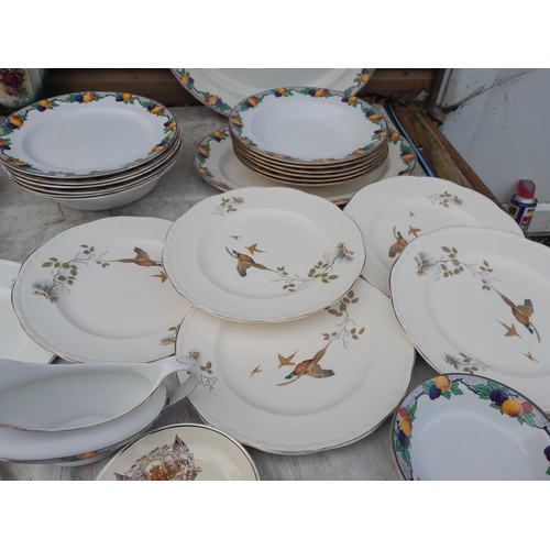 316 - Assorted vintage dinnerware, commemorative ware and Golly jug