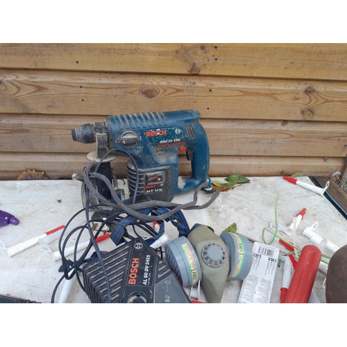 421 - Bosch drill and various chargers etc.