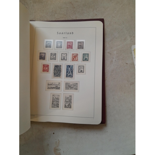 456 - Stamps : sparsely filled printed hingeless pages Saar collection