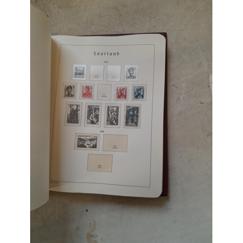 456 - Stamps : sparsely filled printed hingeless pages Saar collection