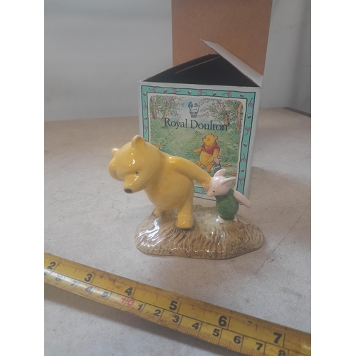 485 - Royal Doulton Winnie the Pooh figure in box of issue : Pooh and Piglet Windy Day