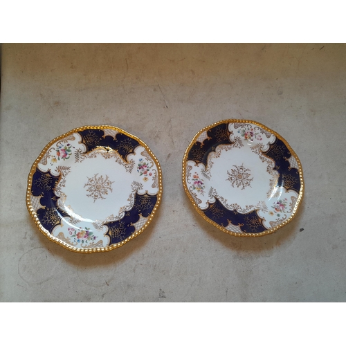 491 - Pair of early 20th century gilded and decorated Coalport plates