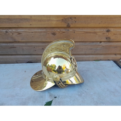 538 - Modern copy of a brass firemans helmet