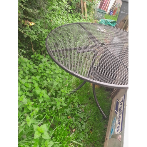 37 - Metal garden bench, patio table, parasol stand and garden tools