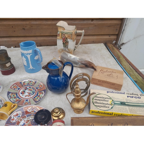 48 - Assorted posters, brass ware, bone ornaments, damaged Doulton jug, vintage advertising etc.