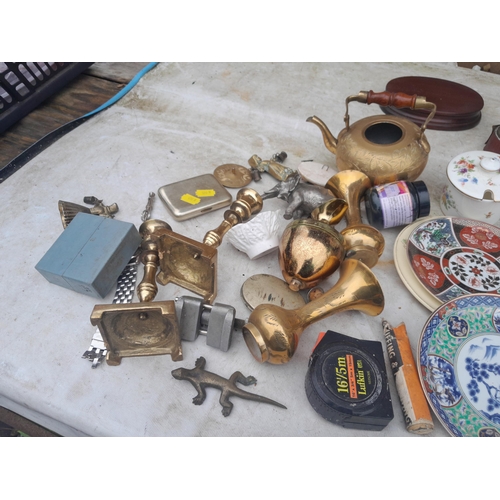 48 - Assorted posters, brass ware, bone ornaments, damaged Doulton jug, vintage advertising etc.