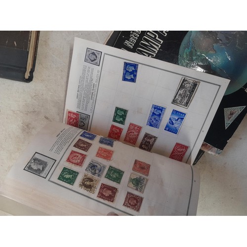 85 - A world Collection of mainly used stamps, some mint noticed, school boy collections in well and part... 