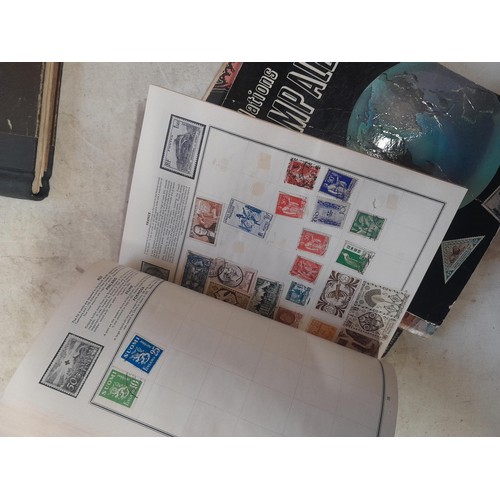 85 - A world Collection of mainly used stamps, some mint noticed, school boy collections in well and part... 