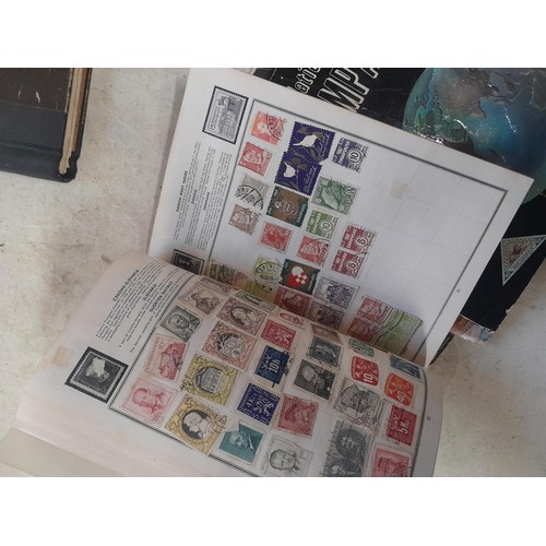 85 - A world Collection of mainly used stamps, some mint noticed, school boy collections in well and part... 