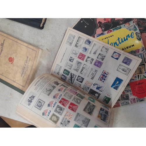 85 - A world Collection of mainly used stamps, some mint noticed, school boy collections in well and part... 