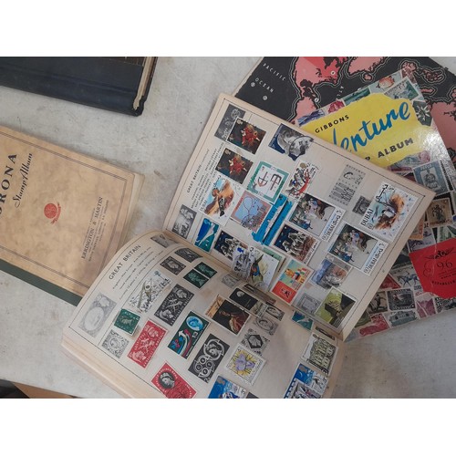 85 - A world Collection of mainly used stamps, some mint noticed, school boy collections in well and part... 