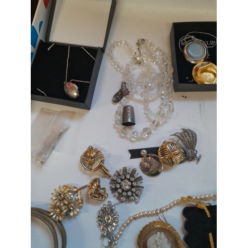 123 - Assorted costume jewellery some in presentation boxes, very small amount of silver noticed