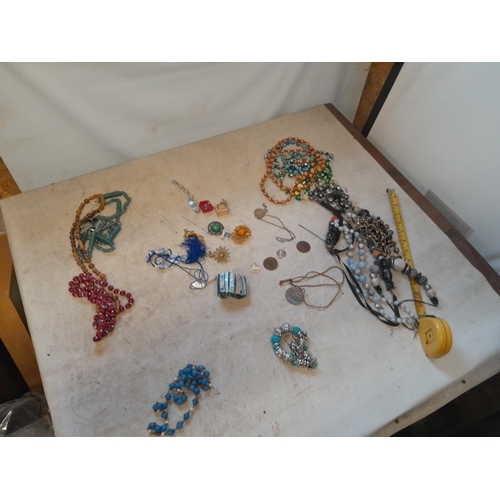 126 - Costume jewellery, very small amount of silver noticed,