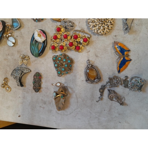 127 - Costume jewellery :brooches, beads for repurposing, vintage ladies wristwatch, buckles etc.