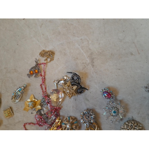 127 - Costume jewellery :brooches, beads for repurposing, vintage ladies wristwatch, buckles etc.