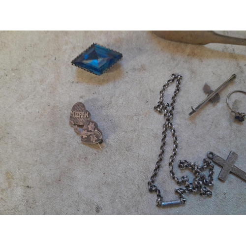 129 - Assorted silver and other items : light watch chain, MIZPAH brooch, crucifix, sugar tongs, silver bu... 