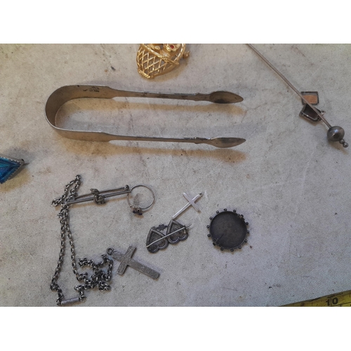 129 - Assorted silver and other items : light watch chain, MIZPAH brooch, crucifix, sugar tongs, silver bu... 