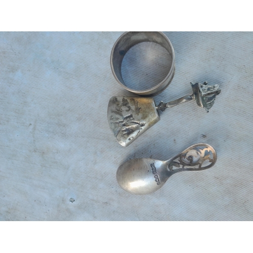 139 - Silver caddy spoon, lower grade Dutch silver spoon and silver serviette ring