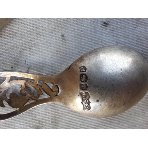 139 - Silver caddy spoon, lower grade Dutch silver spoon and silver serviette ring