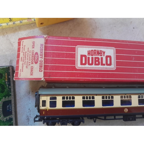 26 - Boxed 00 gauge coach, Dinky toys play worn, & clockwork toy