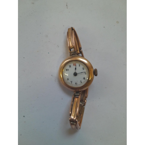 94 - Ladies wristwatch with 9 ct gold case and articulated strap in Elkington presentation box, back need... 