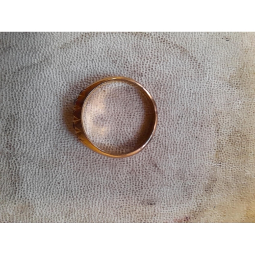 122 - Unmarked 9 ct gold ring set with paste, size O, 2.3 g