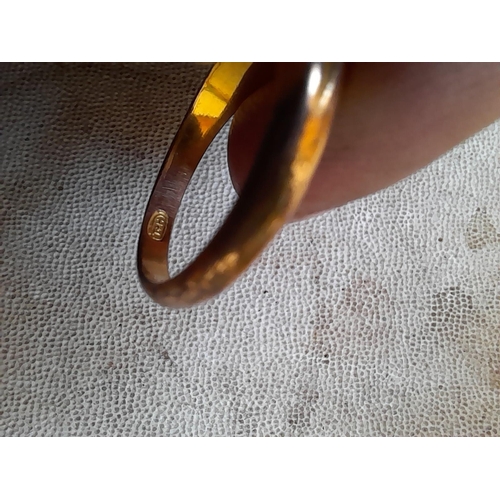 122 - Unmarked 9 ct gold ring set with paste, size O, 2.3 g