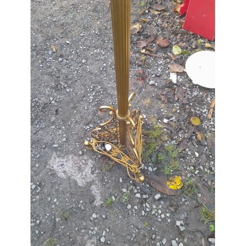 199 - Edwardian brass  paraffin standard lamp on pierced legs converted to electric (neds re wire)