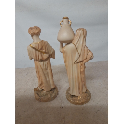 289 - Pair of Royal Worcester blush ivory porcelain figures The Water Carriers both in good order