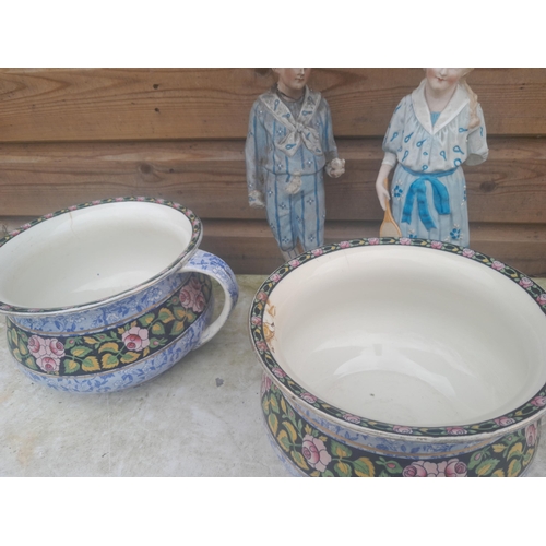 519 - Box of decorative china, damaged and restored poorly bisque figures, wall plates, damaged Doulton pa... 