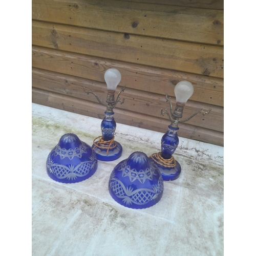 533 - Pair of early 20th century blue and clear Bohemian cut glass table lamps