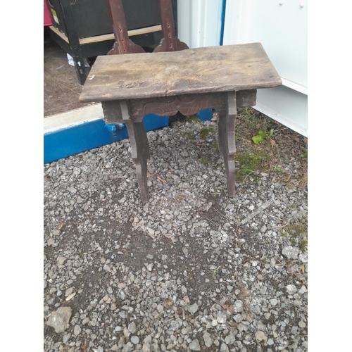 552 - 19th century three leg table  and 19th century carved oak stool 56 cms x 28 cms x 44 cms