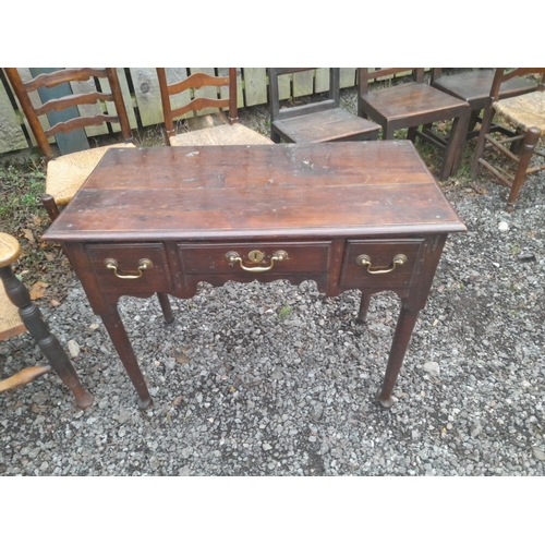 553 - 18th century oak side table with three drawers 54 cms x 92 cms x 74 cms