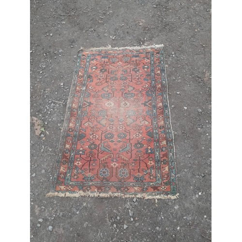 769 - Early 20th century hand woven Persian wool rug (worn in places needs a clean) 47 